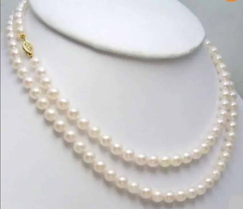 

GENUINE 7-8MM AAA WHITE JAPANESE AKOYA PEARL NECKLACE 32"