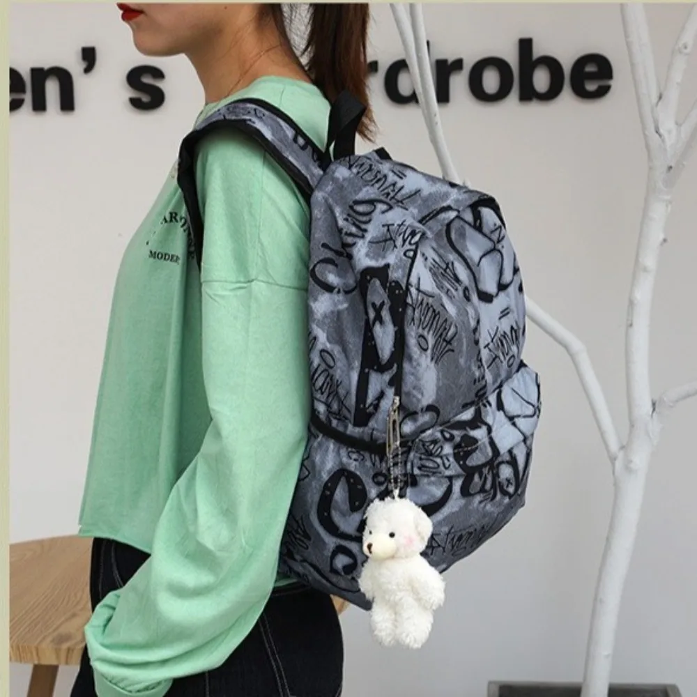 Zaino per studenti Graffiti di grande capacità Zaino da donna casual alla moda Borse da scuola carine per cartoni animati per ragazza per adolescenti