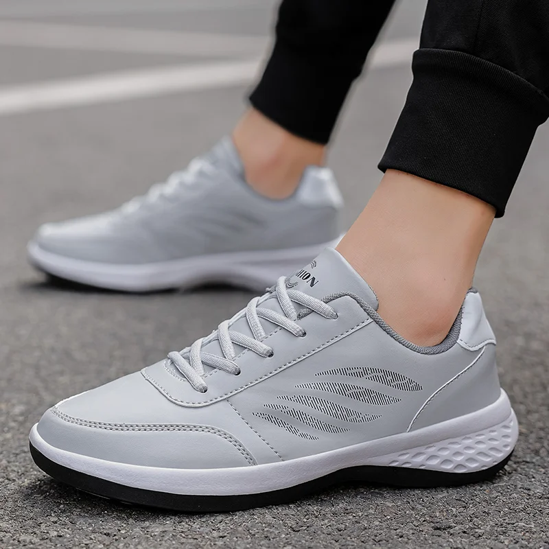 Men Walking Shoe Fashion Casual Sneakers Women Non-slip Man Lightweight Trendy PU Leather Waterproof Board Shoes Couple Footwear