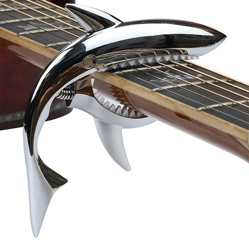 

Зажим для гитарного капода из цинкового сплава, износостойкий, прочный, в форме акулы, для электрогитары, замена зажима-капода