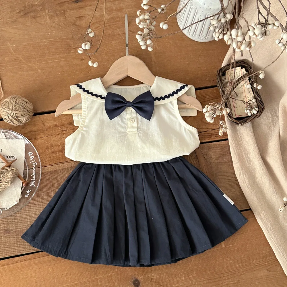 2026 Summer New Baby Girl Preppy Style Sleeveless Bow Tops + Skirts 2pcs Set Infant Clothes Set Cute Toddler Girl Outfits