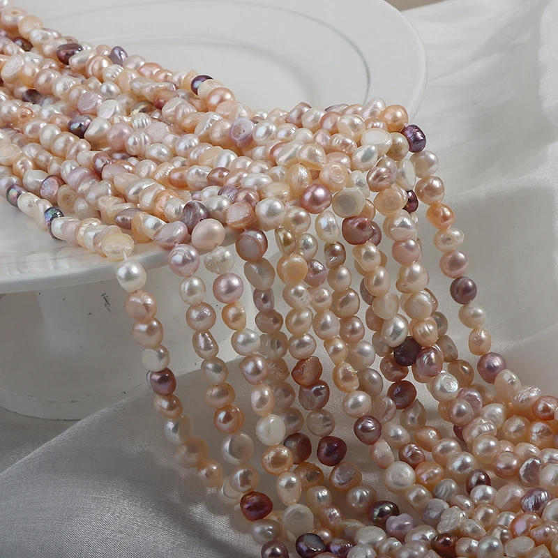 7-8mm candy-colored, seedless side-drilled mixed-color two-sided glossy pearl strand, approximately 35cm long with 48 beads.