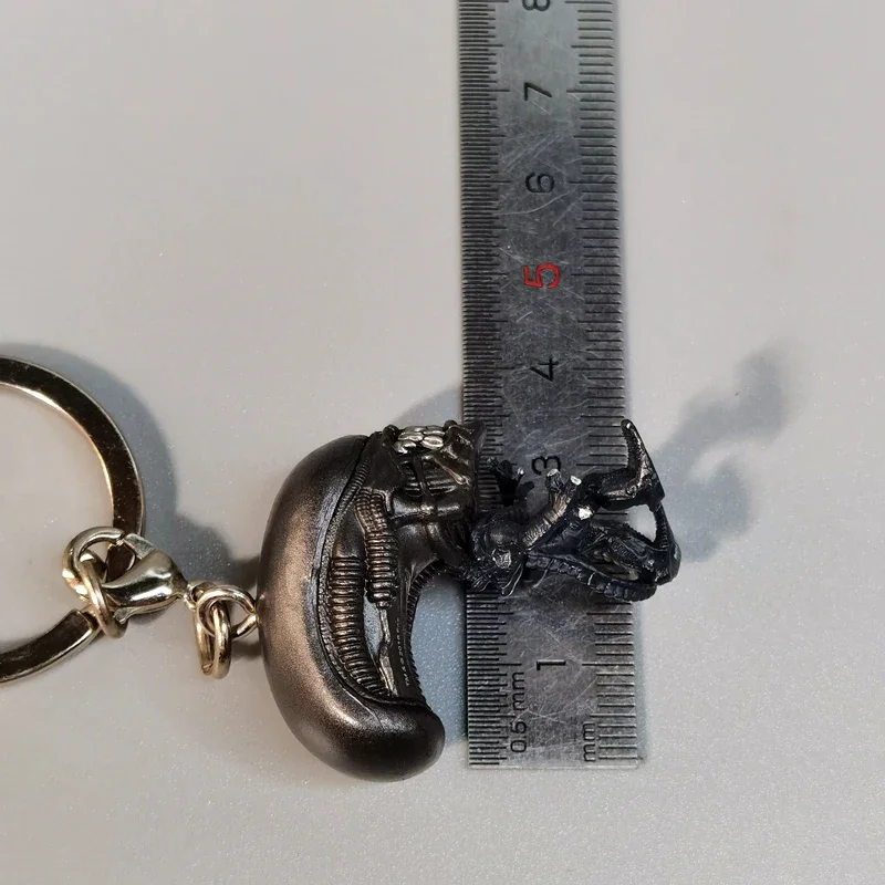 شخصيات الحركة الصغيرة المفترس الغريبة المفاتيح قلادة الوحش نموذج اللعب سطح المكتب الزينة المقتنيات لعب هدايا الأطفال