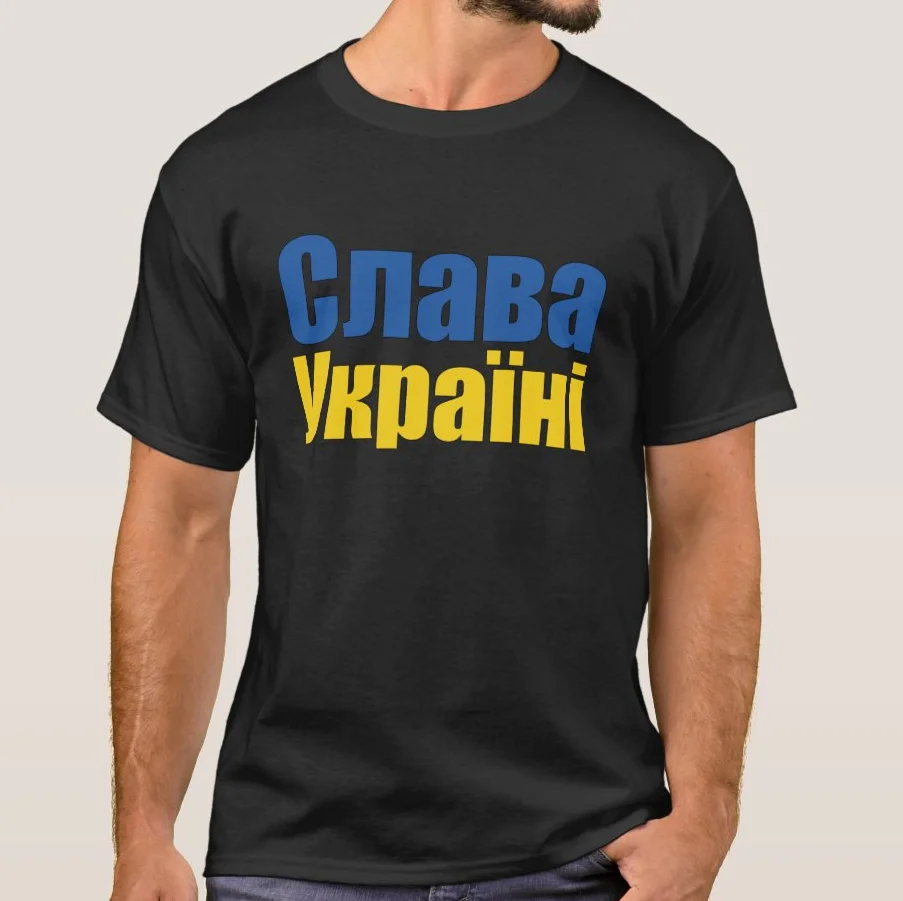 

Slava Ukraini Ukraine Flag Colour Ukrainian Glory Cyrillic Font T-Shirt. Premium Cotton Short Sleeve O-Neck Mens T Shirt S-3XL