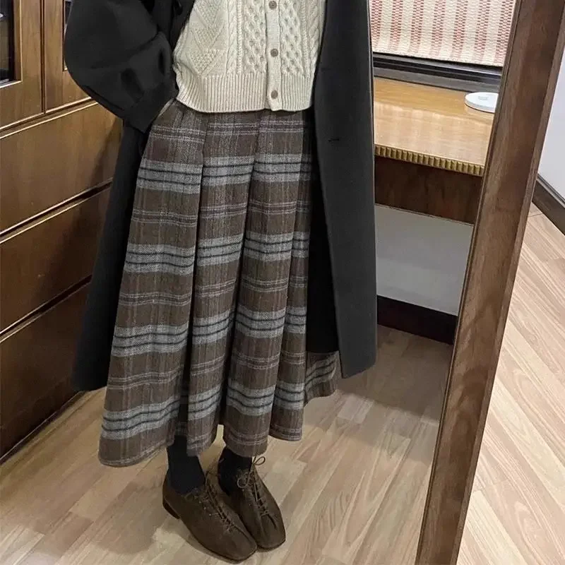 

Autumn and Winter Woolen Plaid Skirt 2024 Women's College Style Jk Age Reducing High Waist Slimming A-line Pleated Skirts