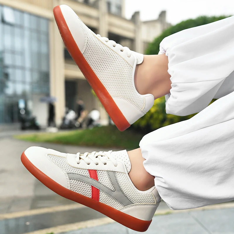 أحذية فنون الدفاع عن النفس الجديدة قابلة للتنفس لعام 2025 للنساء والرجال أحذية تاي تشي منخفضة الجودة أحذية رياضية خارجية مانعة للانزلاق أحذية الكاراتيه التايكوندو