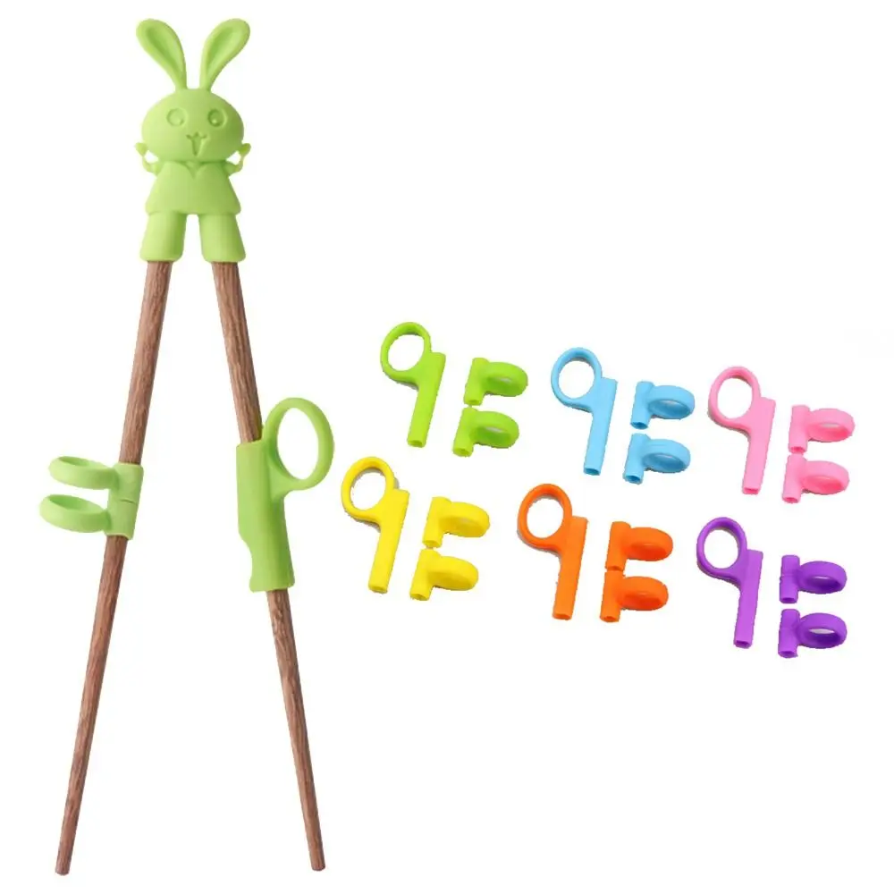 Bambini in silicone che tengono le bacchette Anello di correzione Stoviglie da cucina Eating Practice Accessori per bacchette