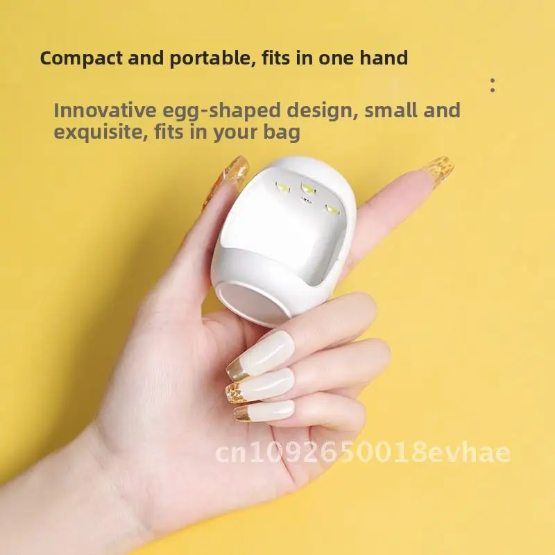 Mini LED Nail Art Light Egg Draagbare handlamp met één vinger voor sneldrogende en lichttherapie Roze/wit niet-zwart handmodel