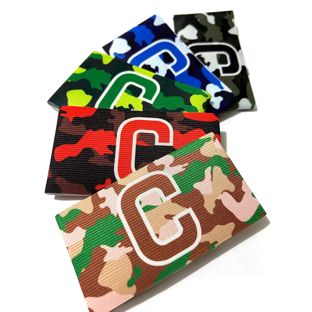 ฟุตบอลพรางปลอกแขนกัปตัน C วงแขนผู้นําเกมสําหรับการแข่งขันฟุตบอลกลุ่มการฝึกอบรมของขวัญ