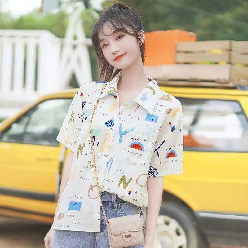 

Hawaiian Blouse Female Hong Kong-style Leisure Loose Beach Fragmented Short Sleeve White Shirt Tide Harajuku Female Top Ins