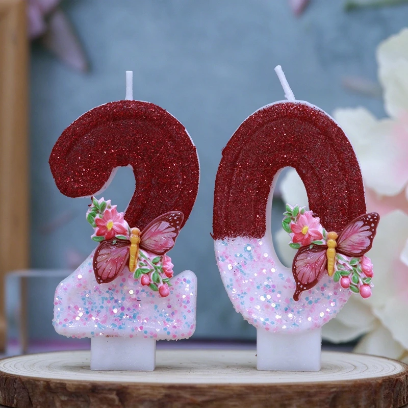 Red and white birthday candles, butterfly and flower decorations for numbers, birthday party women's cake decorations