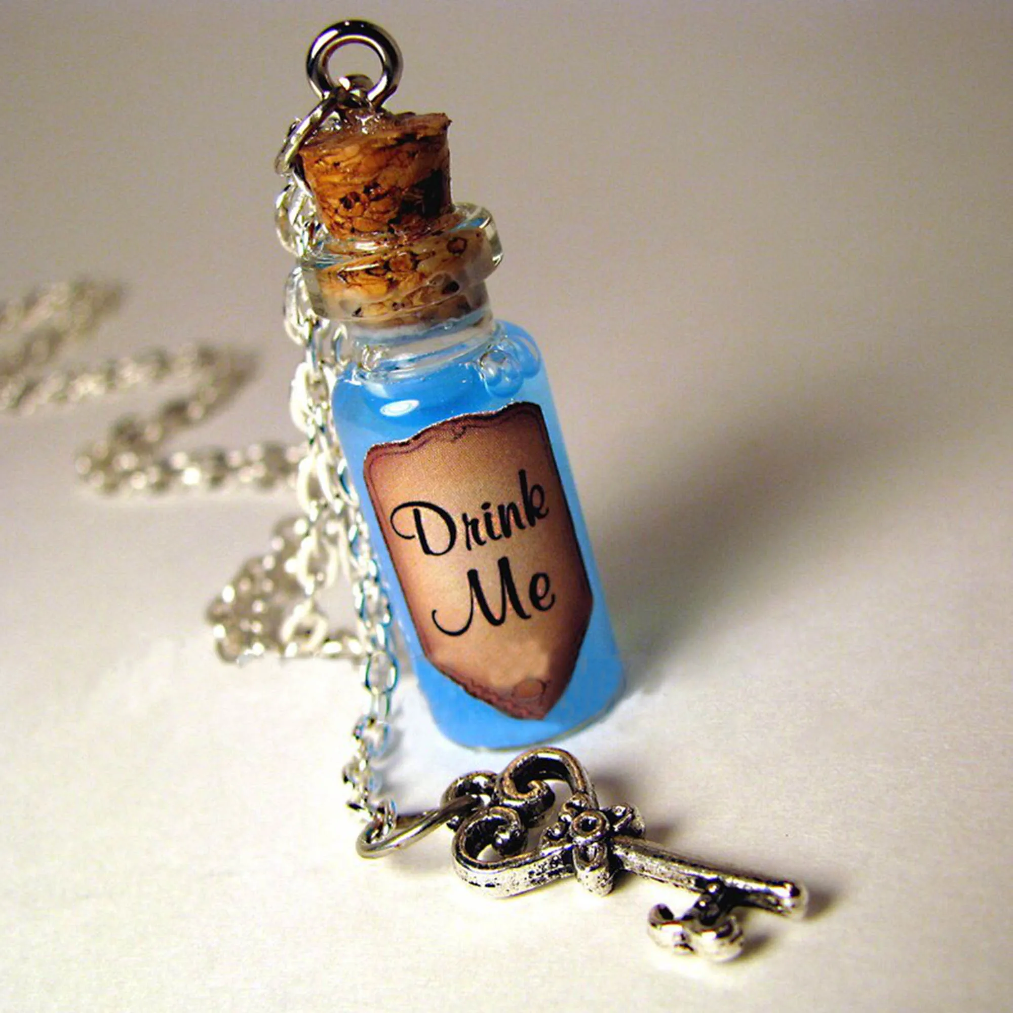 Drink Me Bottle Necklace Alice\'s Adventures in Wonderland Drink Me-Blue Shimmer Liquid with Key Eat Me Vial Charm Potion Magic