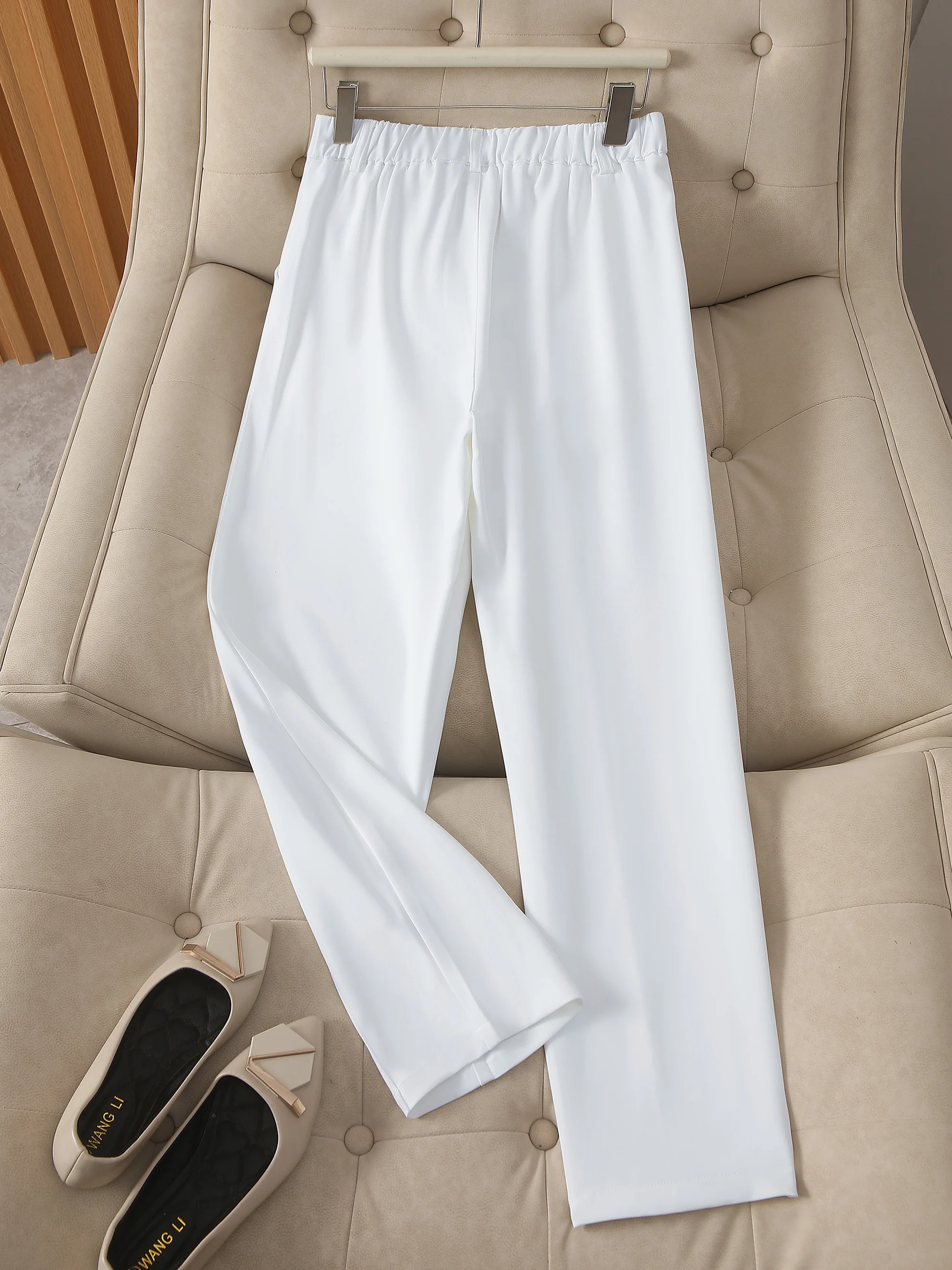 Elegante casual effen damespakbroek, lange broek met knooprits en elastische taille