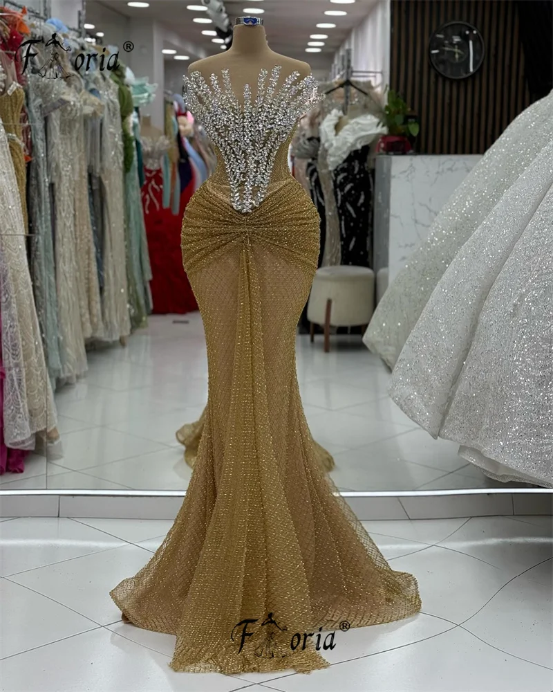 Abito da ballo a sirena da donna arabo oro di lusso Abito da festa speciale sexy con paillettes in cristallo argento senza maniche Robe de soiree personalizzato