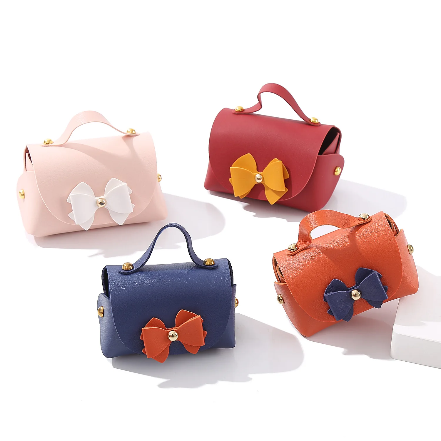 

10 PCS/Lot PU Leather Bow Ribbon Bag Christmas Wedding Candy Jewelry Gift Box Mini Packaging Handbag