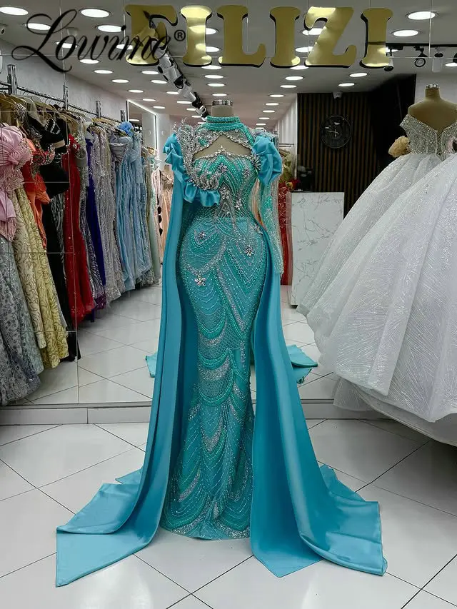 فساتين سهرة حورية البحر بأكمام طويلة باللون الأزرق العربي مع كيب كتف مخصصة لحفلات الزفاف الرسمية الأنيقة للنساء