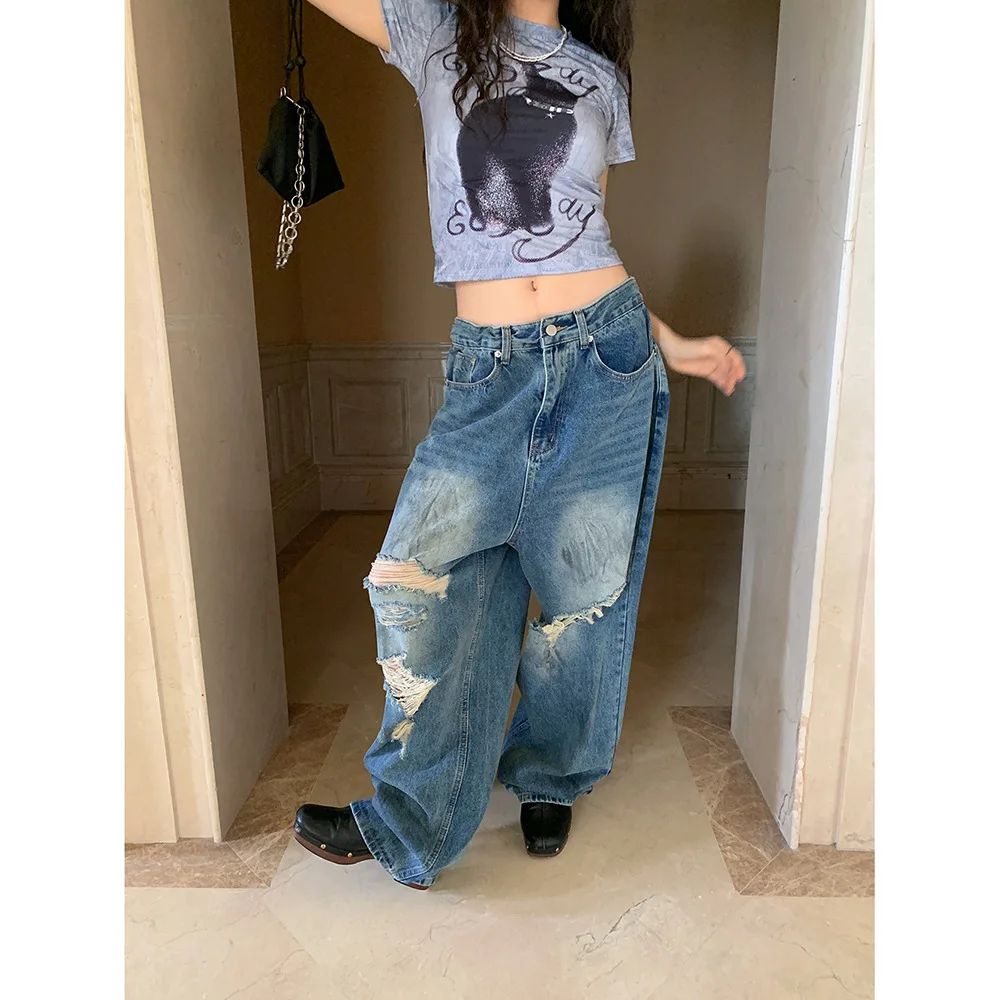 

Джинсы женские широкие брюки винтажные длиной до пола с рваными дырками и высокой талией потертые джинсовые брюки 2025 уличная одежда