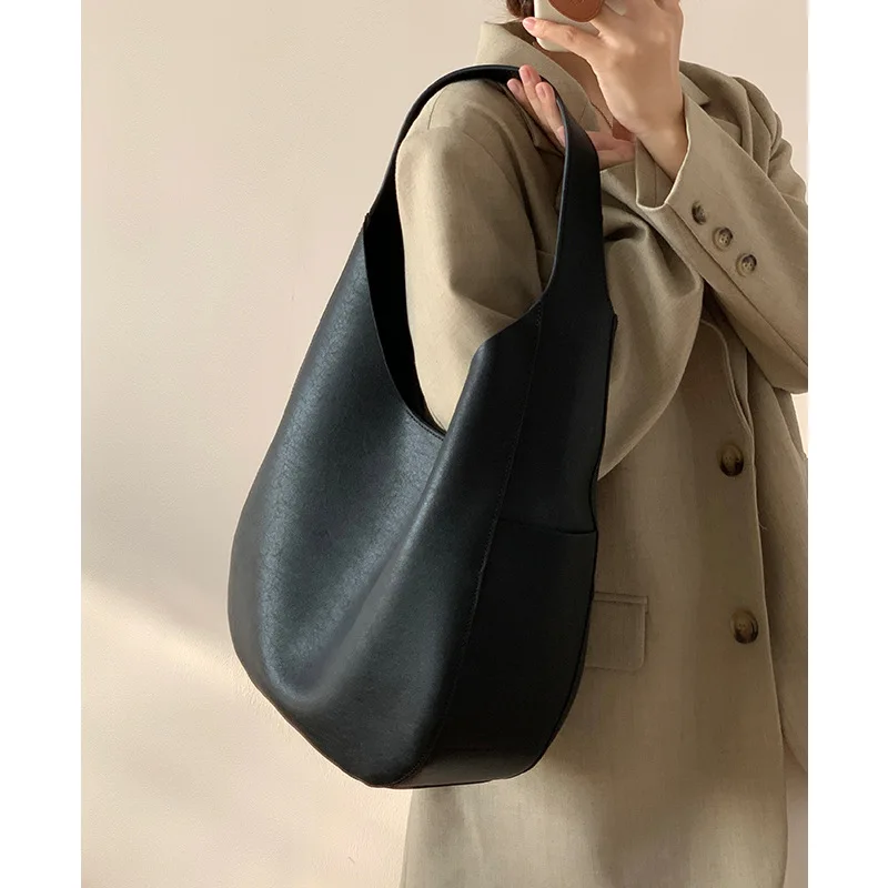 

TopGrainTrove First Layer Cowhide Women 2025 Single Shoulder Large Capacity Commuter Bucket Leather Armpit Designer Luxury Bag