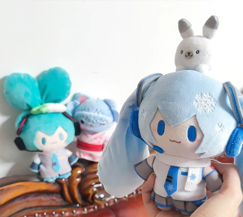 15 ซม.Hatsune Miku Snow Series ตุ๊กตาตุ๊กตา Kawaii รุ่น Q Plushies กระเป๋าเป้สะพายหลังของเล่นตัวเลขการกระทําพวงกุญแจกระเป๋าจี้ของเล่นของขวัญ