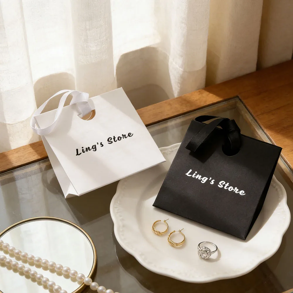 

50Pcs Exquisite 15.5×14.5×7.5cm Custom Logo Jewelry Gift Bag Cosmetic Lipstick Eyelash Dessert Fashion Packaging Handbags