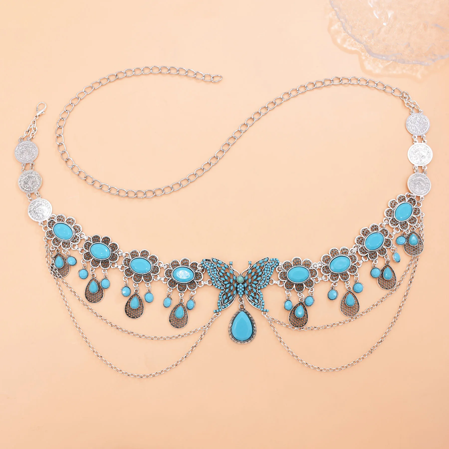 

Kazakh style faux turquoise butterfly hollow teardrop tassel women's waist chain, accessory for holiday parties and dresses
