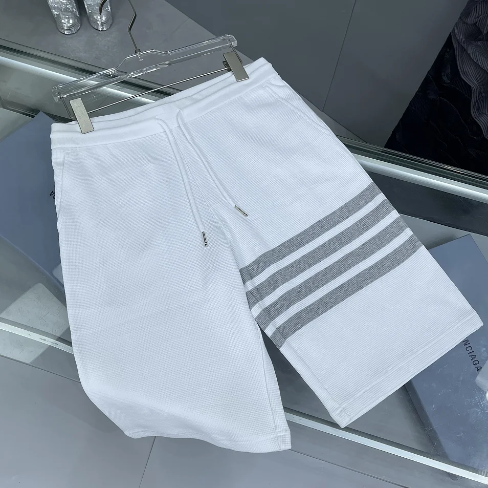 

Летние мужские спортивные повседневные шорты-бриджи из высококачественного пэчворка с четырьмя полосками, белые, свободного кроя, класса люкс, пляжные, модные, средней длины