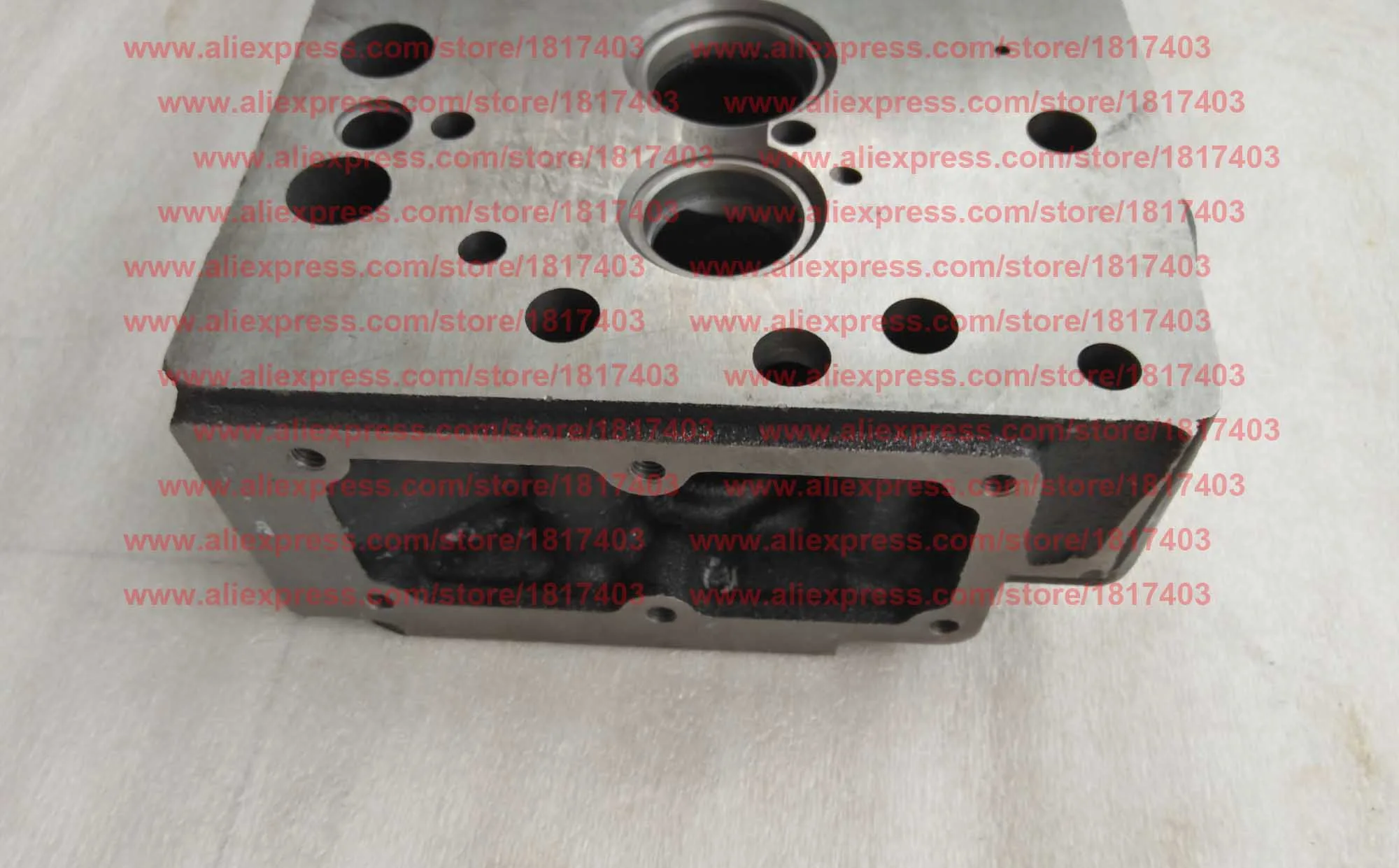 Jiangdong TY3100I.1.1-1 رأس الأسطوانة (طراز 20 مم)، أجزاء محرك الديزل Jiangdong TY3100IT