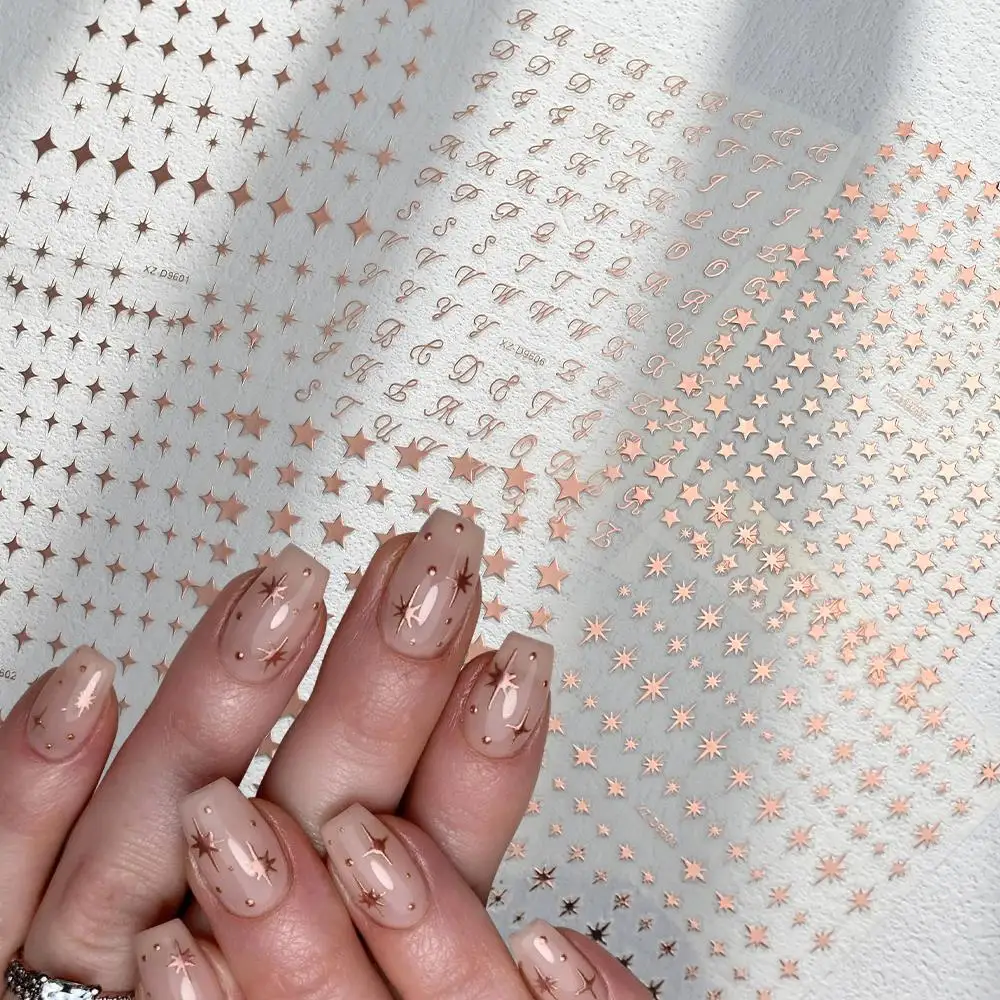 

6Pcs 3D Champagne Gold Y2K Star Letter Nail Stickers Cross Starlight Pentagram Nails Decals Self-Adhesive Stars Manicure Sliders