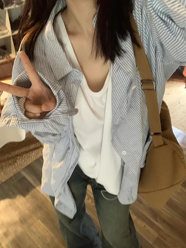 

Синяя солнцезащитная повседневная женская одежда irt, лето 2024, новая свободная удобная корейская офисная одежда в тонкую полоску с воротником-стойкой