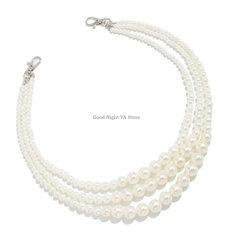 حقيبة يد بسلسلة جانبية من اللؤلؤ على سروال الجينز لراقصات الفتيات في العقد الأول من القرن الحادي والعشرين #2