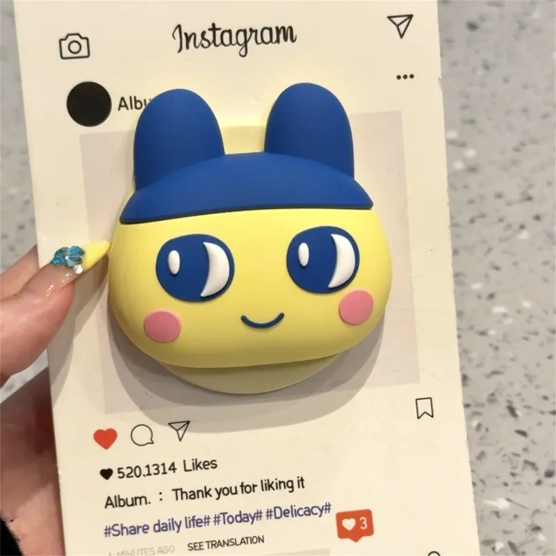 Tamagotchi Mametchi Lovelitchi Kuchipatchi creative animation peripheral magnetic bracket secondary cartoon mobile phone bracket view 2