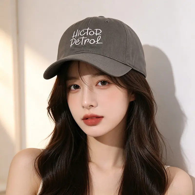 Korean version of letter embroidered baseball cap women's new versatile face small couple street casual sunshade cap