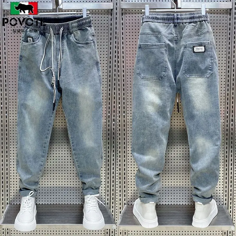 Moda coreana streetwear marca de luxo masculino cordão casual solto jeans para primavera e outono elegante calças de carga