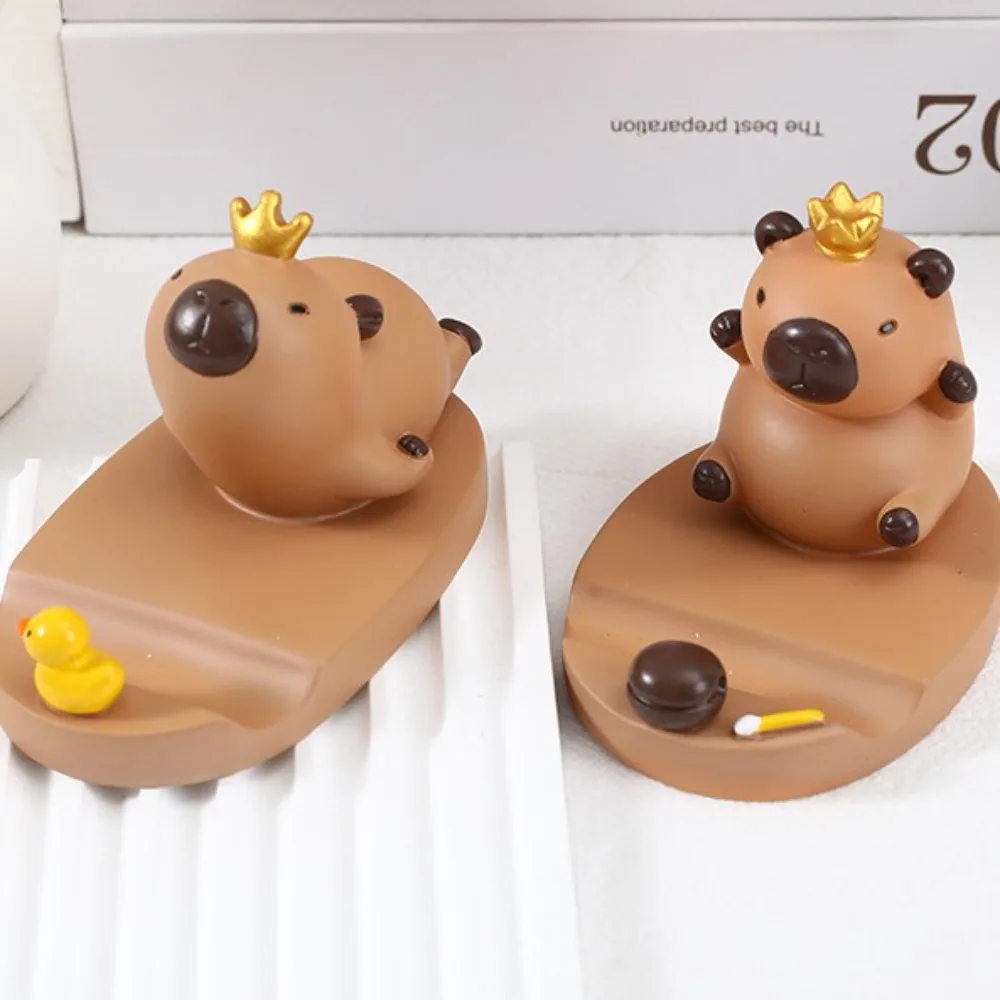 

Фигурка Модель Капибара Держатель для телефона Поддержка Декор стола Капибара Подставка для мобильного телефона Животное Мультфильм Капибара Кронштейн для мобильного телефона