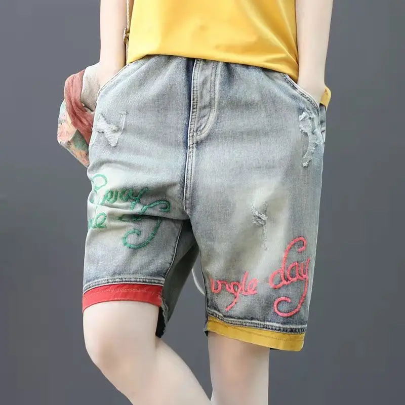 Sommer Neue Retro Stickerei Lose Zerrissene Blume Elastische High-Taille Harem Denim Shorts Für Frauen
