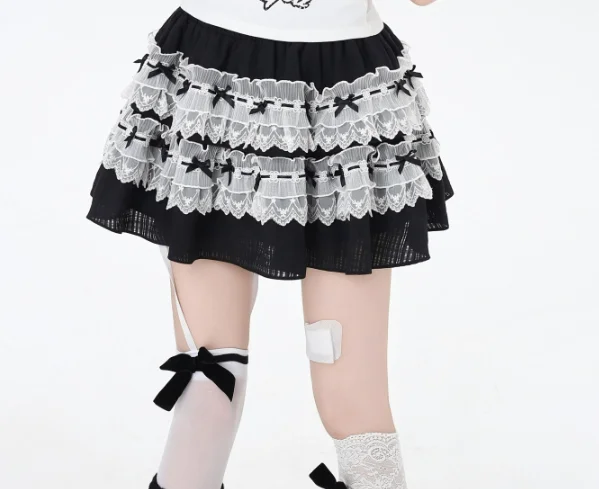 กระโปรงลูกไม้สีดำขาวสไตล์ญี่ปุ่นน่ารัก ดีไซน์โบว์  กระโปรงทรงเค้กเอวสูง  แฟชั่นฤดูใบไม้ผลิและฤดูร้อน  ใส่ได้หลากหลาย  ช่วยให้ดูอ่อนวัย