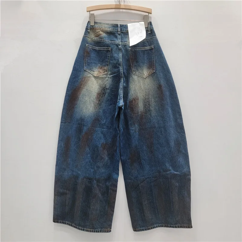 Spodnie damskie na jesień 2025, nowa moda, uniwersalne, wyszczuplające, luźne, z szerokimi nogawkami, jeansy w stylu vintage z efektem zniszczenia.