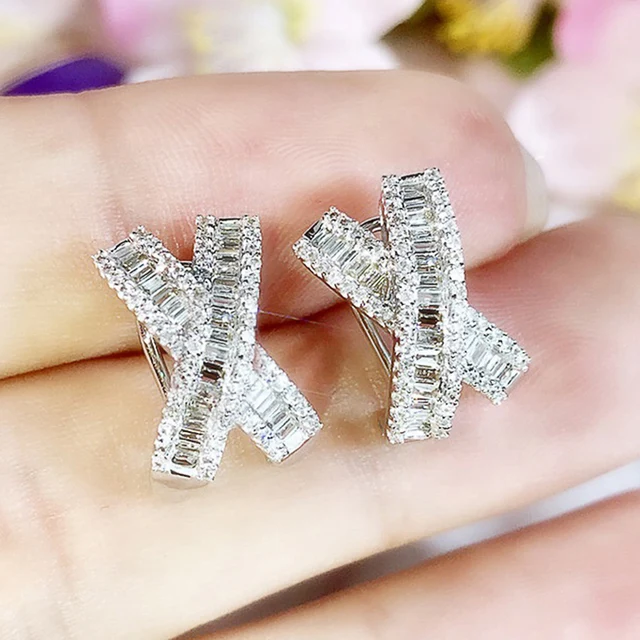 Huitan fantazyjne kolczyki w kształcie litery X z olśniewającą białą cyrkonią sześcienną luksusowe kolczyki dla kobiet Wedding Party oświadczenie biżuteria