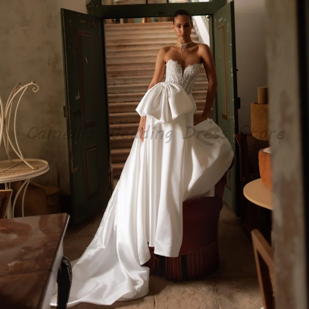 White Strapless Satin A-Line Wedding Dress 2026 Luxury Beaded Lace Bodice Oversized Bow Bridal Gown With Train