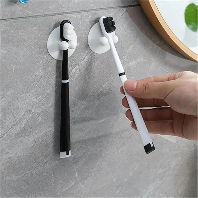 Suction cup type toothbrush holder Free punch simple toothpaste clip Household bathroom multi-functional dental storage shelf