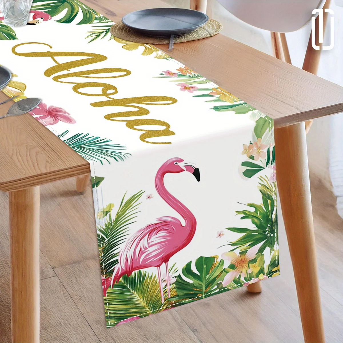 A decorative tablecloth for the living room dining table with patterns featuring flamingos and tropical plants