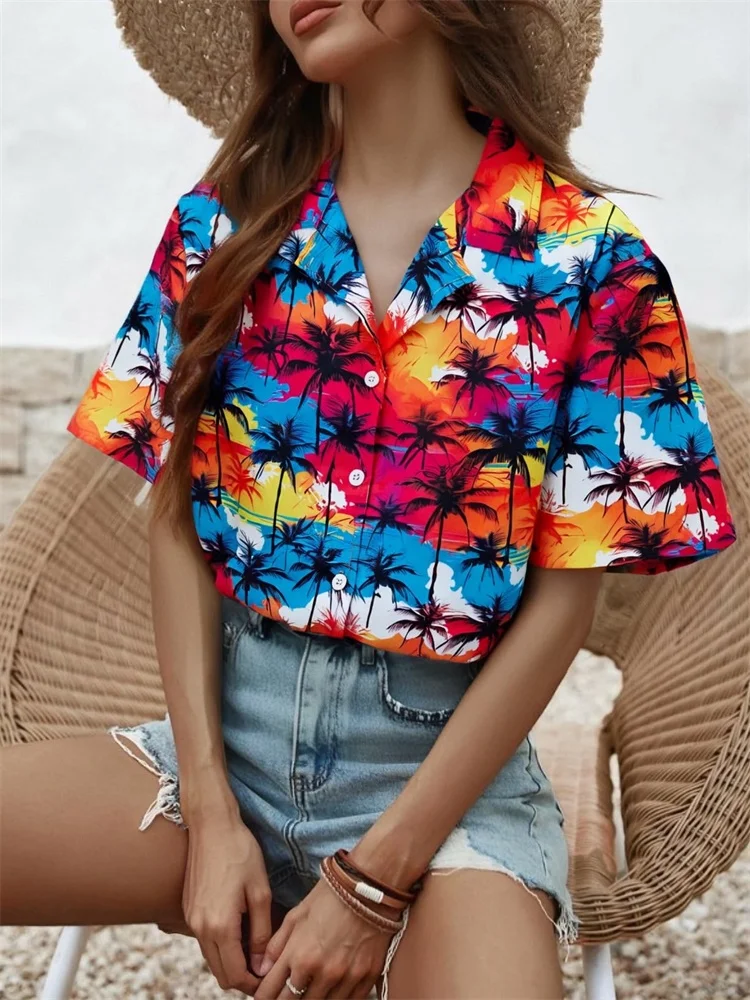 2025年新作のトロピカルな植物プリントが施されたレディース半袖シャツは、ファッショナブルでカジュアルな夏の休暇にぴったりです。