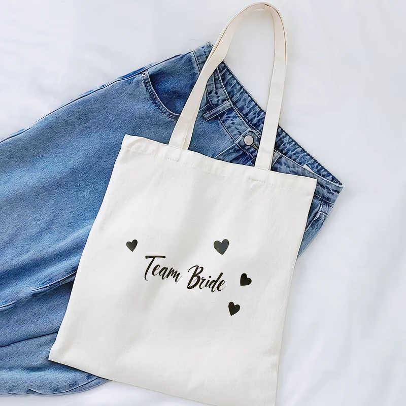 Bride Team Canvas Tote Bag Stylish Large Capacity Reusable for Wedding Daily Use Commute Shopping Beach Travel Parties.