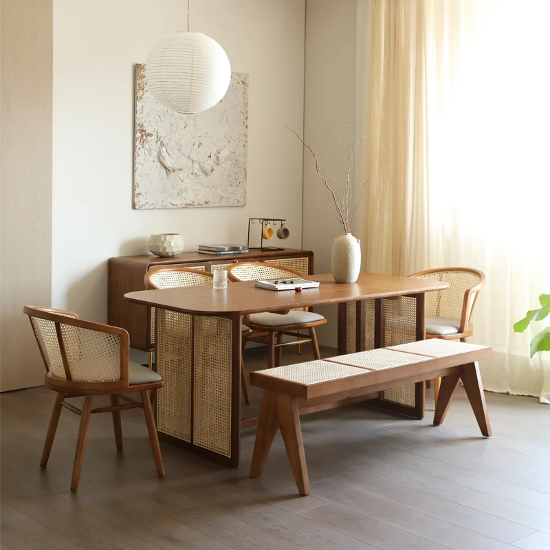 

Solid wood rounded dining table modern and minimalist small household rattan woven dining table and chair combination