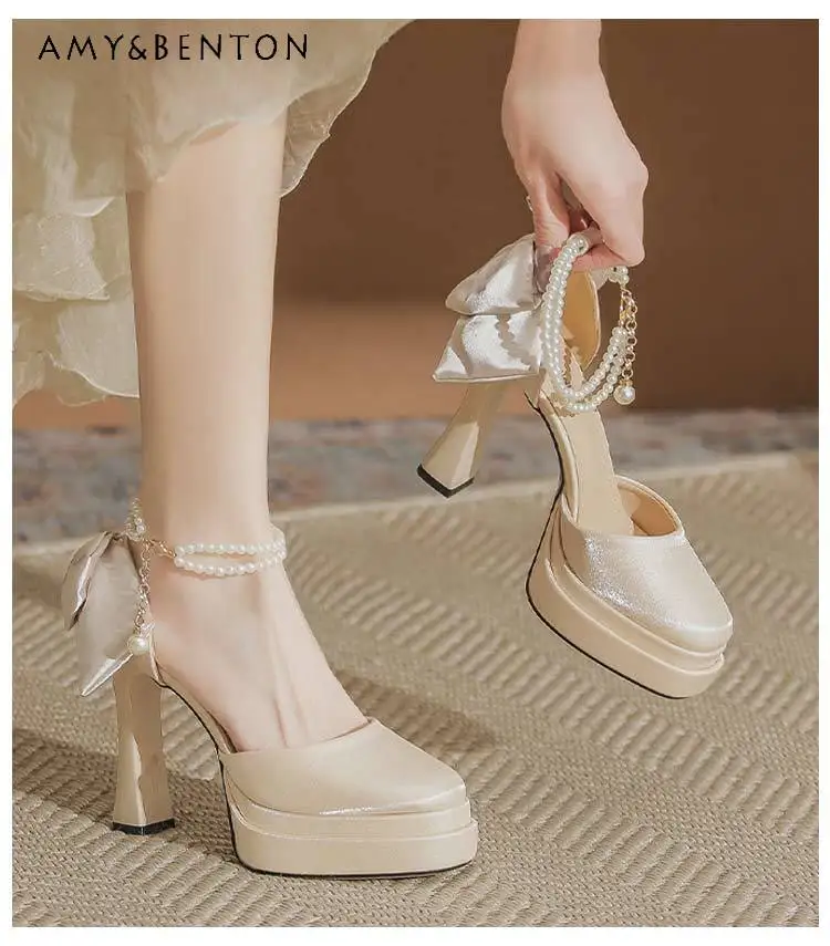 

One-word Buckle Hollow Waterproof Layer High Heels Thick Heel Women's Spring and Summer 2025 New Bow Champagne Wedding Shoes