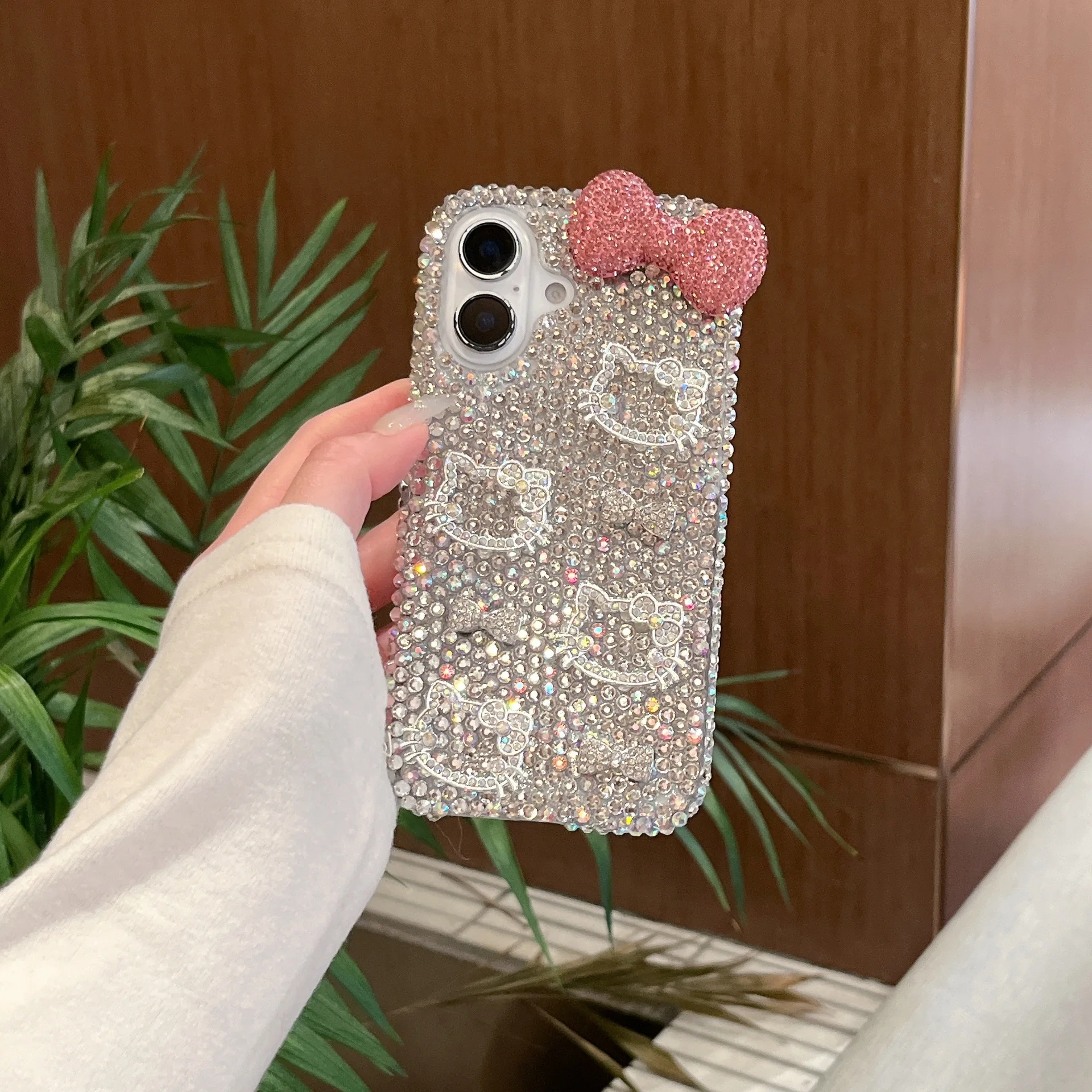 

3D Sparkly Rhinestones Sanrio Hello Kitty Bowknot Phone Case for iPhone 16 Pro Max 15 Pro 14 Plus 13 12 11 Full Coverage
