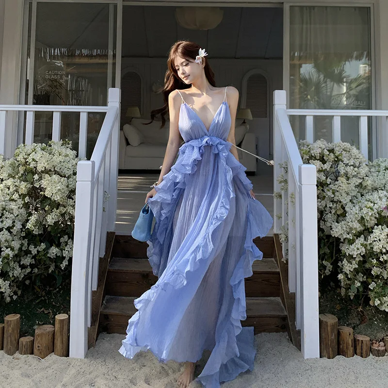 Seaside Vacation Dress Women's Summer 2026 New Celebrity Temperament Suspender Backless Yellow Skirt High Value Age Reduction
