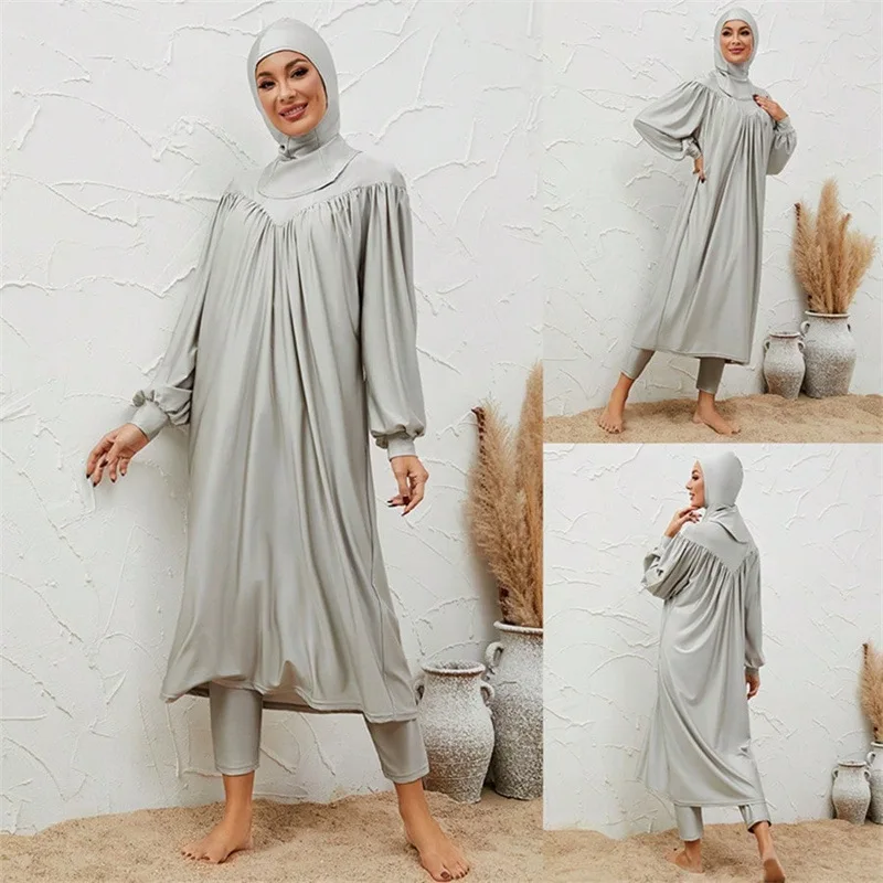 

Женский мусульманский купальник из 3 предметов: платье, хиджаб, брюки с высокой талией. Скромный купальный костюм с полным покрытием.