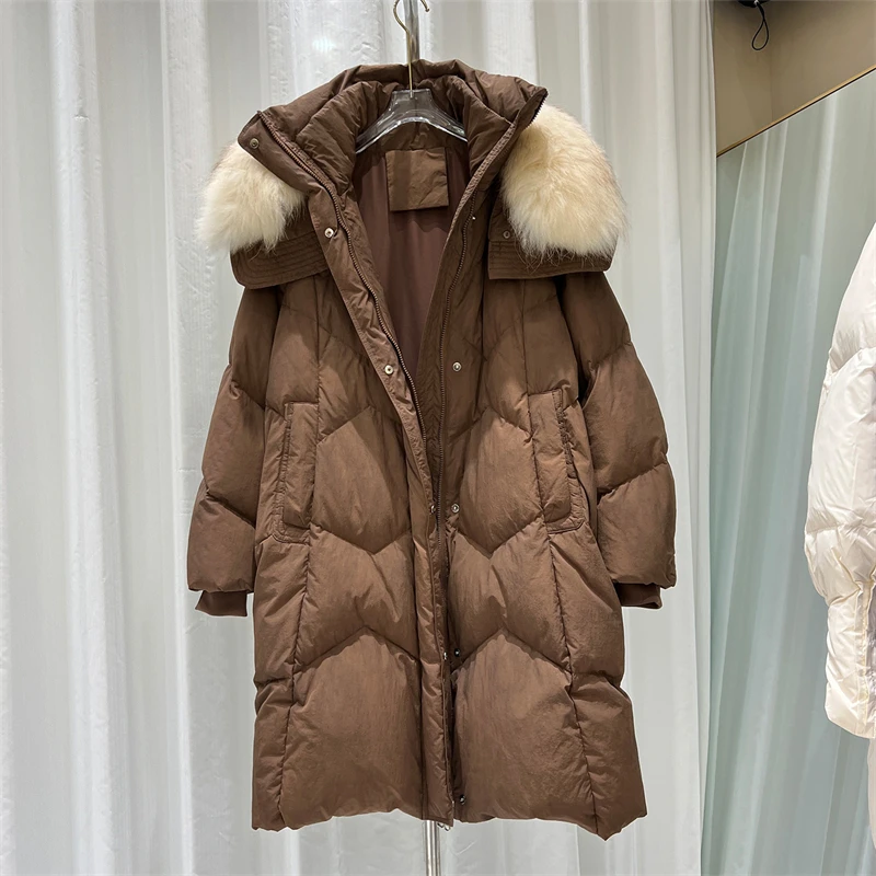 سترة نسائية شتوية جديدة لعام 2025 بياقة من فرو الثعلب y2k عالية الجودة ممتدة فضفاضة وسميكة من ريش البط الأبيض معطف أنيق