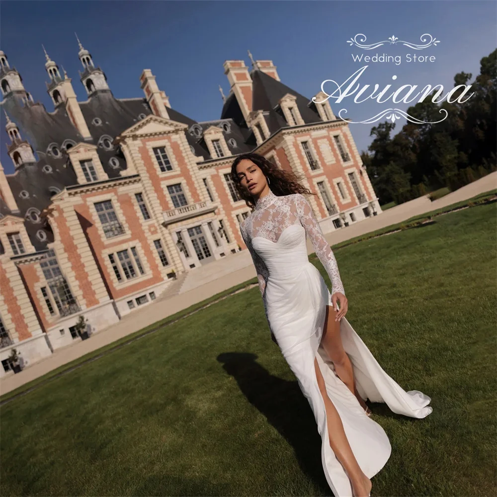 

Aviana индивидуальное свадебное платье с высоким воротом и длинными рукавами, кружевной лиф с вышивкой и рюшами, дизайн с высоким разрезом по бокам, свадебное платье русалки